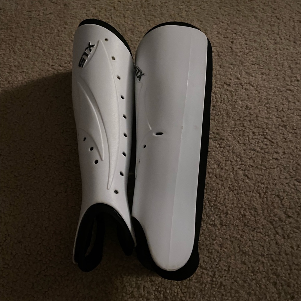 Hockey Shin Guards, 3 Rash Guards, White Socks And Bl… Gem